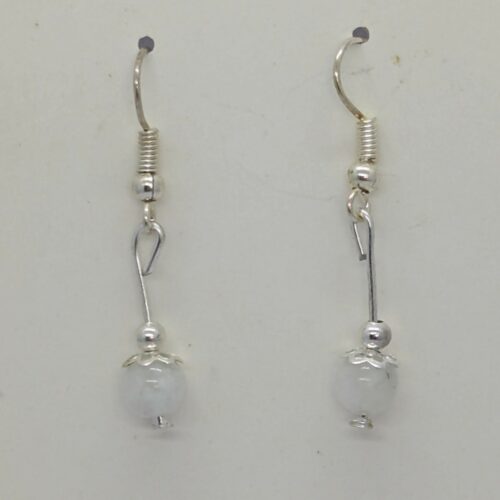 Boucles d’oreilles en pierre de lune, pierre de la féminité.