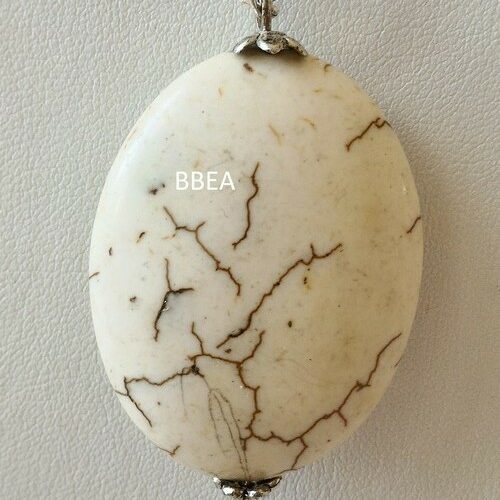 Pendentif magnésite, pierre de la détente.